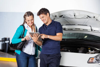 Speed of Service - Mechanic Helping Auto Repair Customer